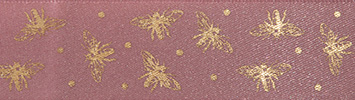 Gold bees on a pink background